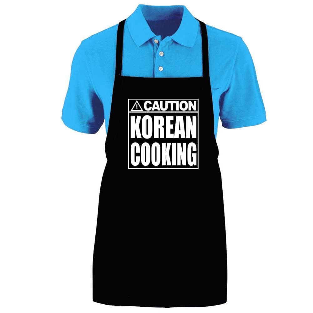 Funny "CAUTION - KOREAN COOKING" Apron; One Size Fits Most - Medium Length Kitchen Aprons for Men, Women, Teen, & Kids (Unisex); Soft Cotton Polyester Mix with DuPont Teflon Fabric Protector. Great gift idea.
