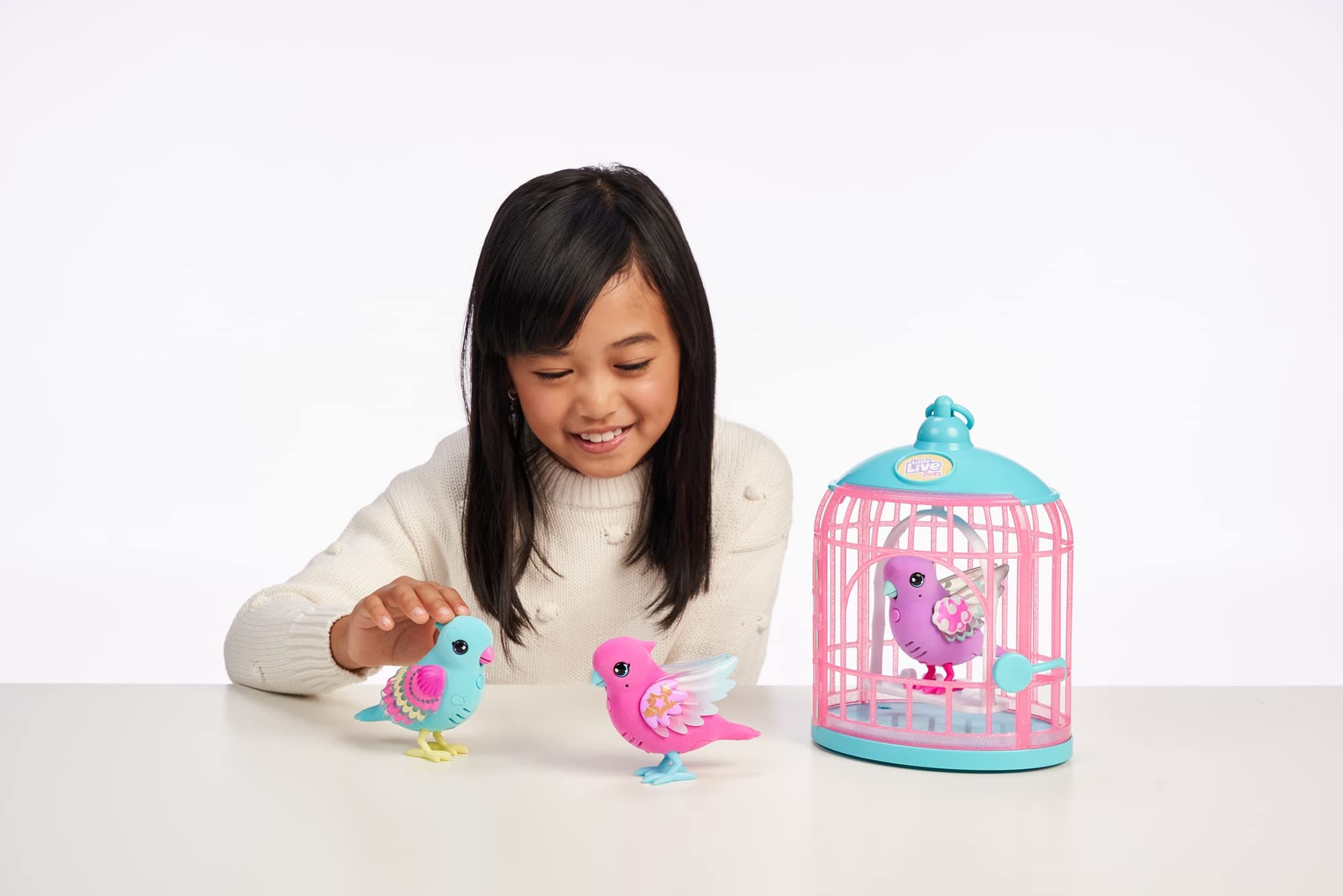 Little Live Pets - Lil' Bird Single Pack: Tweet Twinkle | Interactive Toy Bird, 20+ Sounds, Light Up Wings, Repeats What You Say