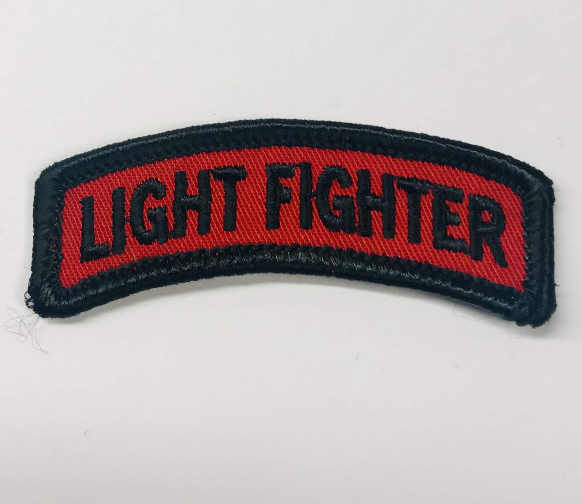 LIGHTFIGHTER TAB - RED and Black - 2 1/2" X 1" 7th Infantry Division Wax Backed Embroidered tab - Bayonet Division - Hourglass Division - Lightfighter Division - Light Infantry Division