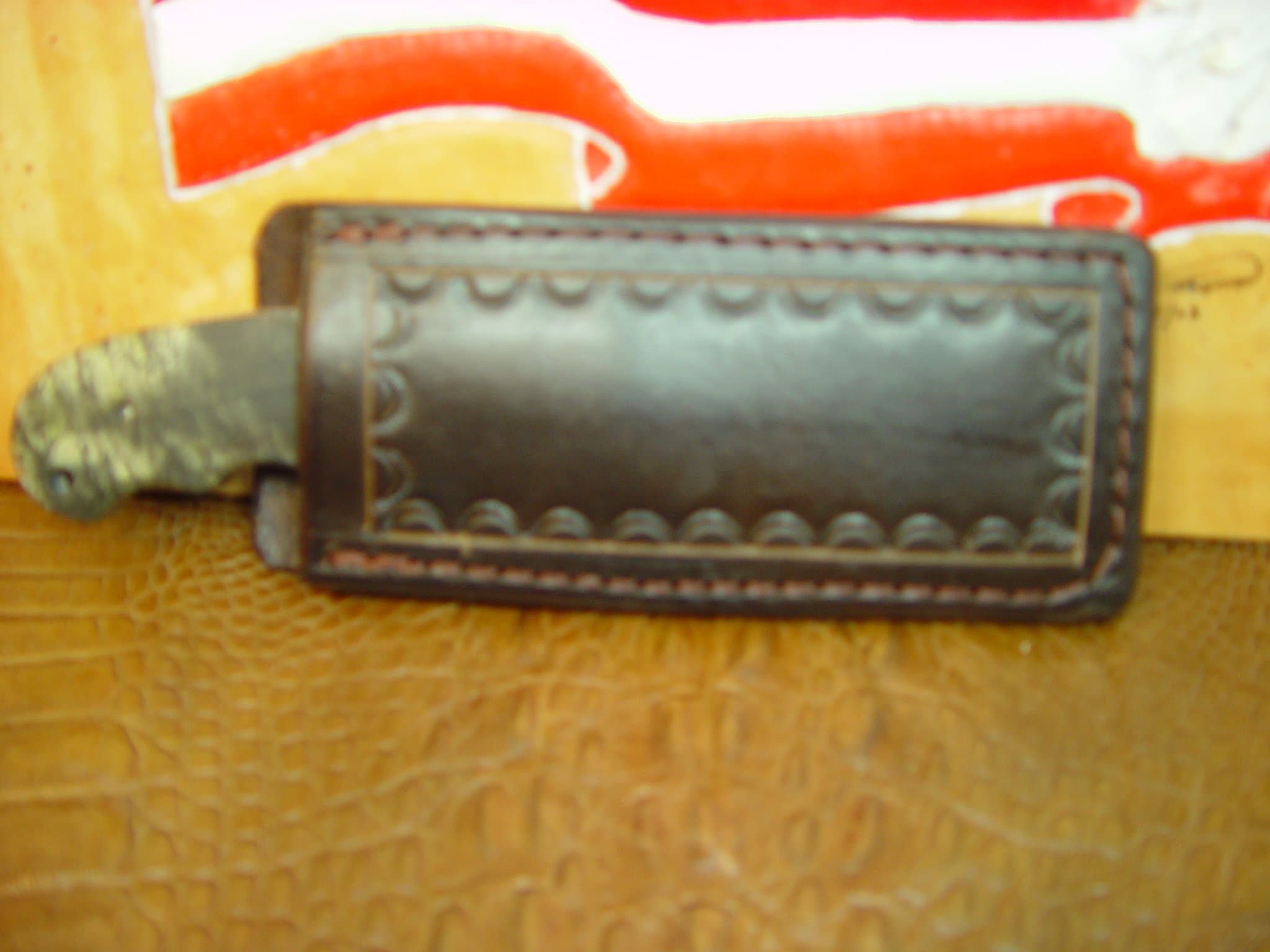 New Leather Pocket Sheath for a Fixed Blade Knife. Overall Length of the Sheath Is 5 3/4"by 2 1/2",the Opening in the Sheath Is 1 3/4". It Is Made Out of Water Buffalo Hide Leather Soft and Durable. The Sheath Is Dark Brown.