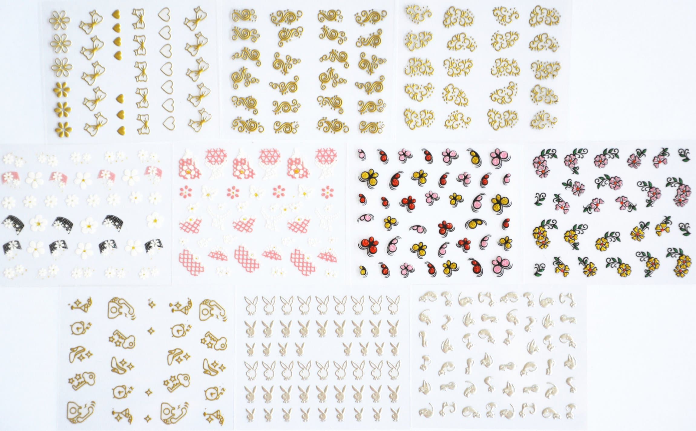 10pcs/package nail stickers decals multi mix designs including gold flowers and butterfly bows/gold heart/gold key/gold telephone/gold high heel/silver rabbits/silver cats/pink flowers/etc.